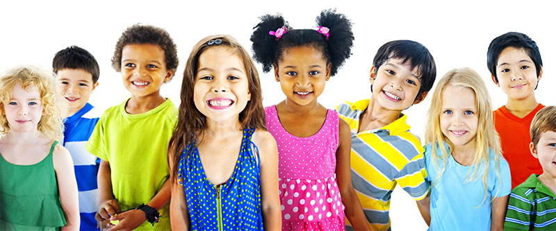 A group of children with diverse clothing and colors, posing together for a photograph.